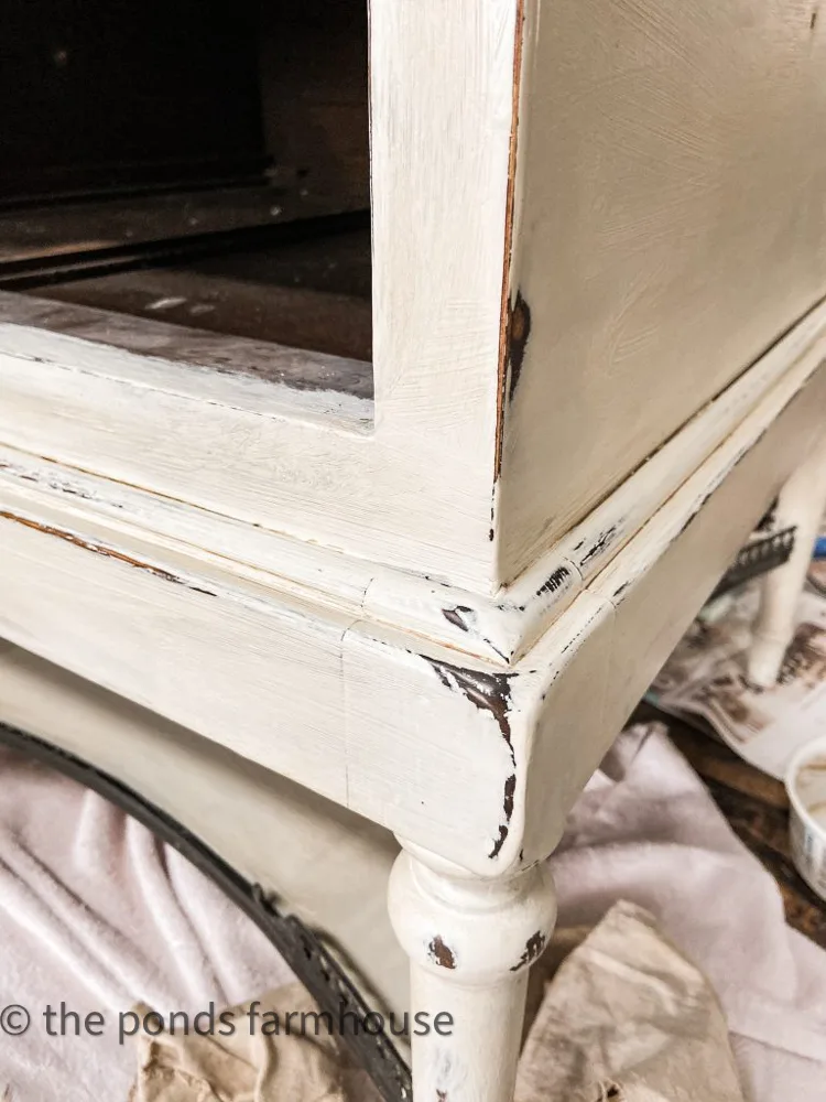 White Distressed Chalk Paint technique for Industrial Style Furniture Transformation.