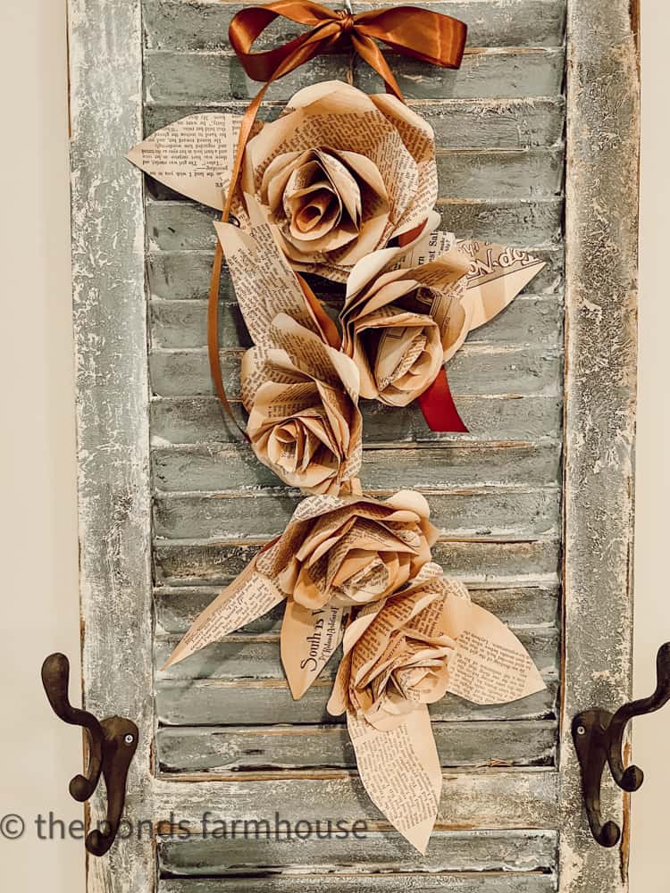 paper rose swag on a vintage shutter.  DIY Farmhouse Decor.