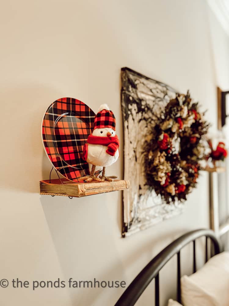 Snow Birds in plaid along with a winter wreath on a vintage ceiling tin.  