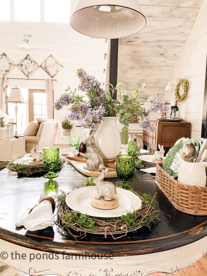 Easter Tablescape with pewter bunnies and DIY twig and moss plate chargers with vintage ironstone dishes.