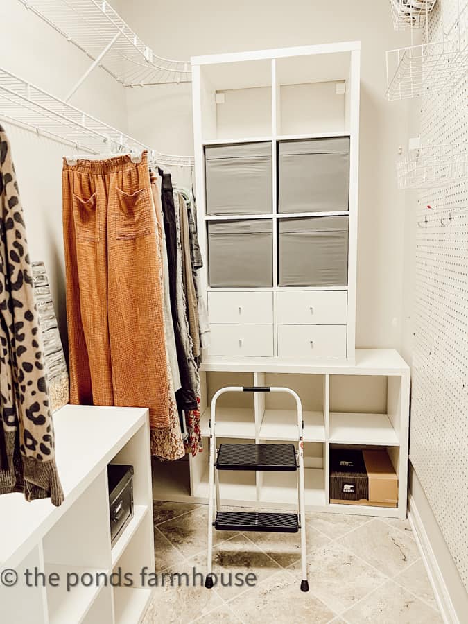 IKEA Kallax Units add much-needed storage to an underutilized closet space.  Budget Closet Makeover & Closet Design Ideas