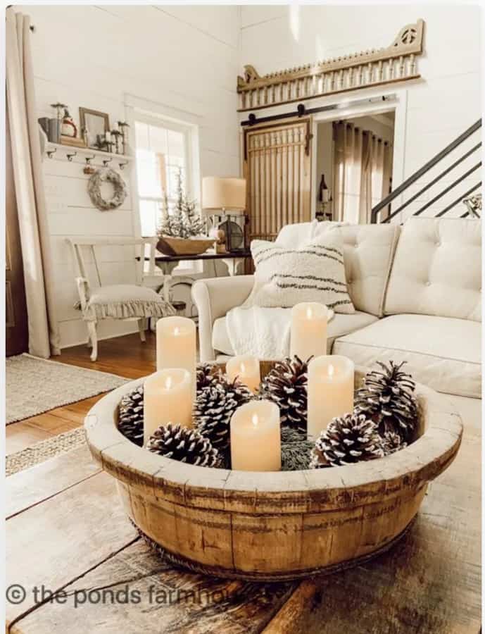 Vintage Wooden Bowl with candles and pine combs. Farmhouse living room.