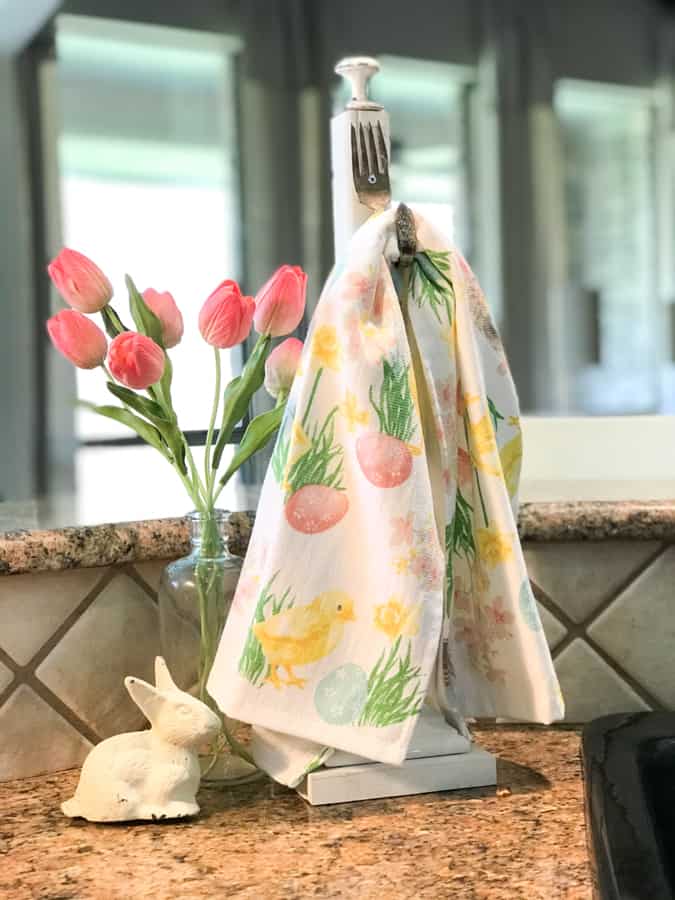 How to Decorate your kitchen for Easter with florals, bunnies and a cute kitchen towel with easter eggs & baby chicks.  Perfect for Easter HOme Decor