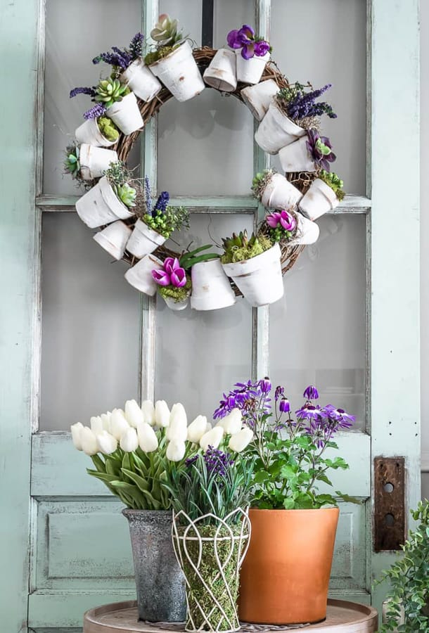 Terra cotta pot and Dollar Tree Floral Wreath.  DIY Spring Decor for Farmhouse Decorating.