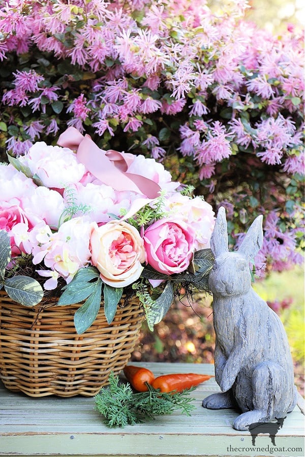 How to Decorate an Easter Basket for Spring with a concrete bunny and faux carrots.  Peonies fill the basket for Easter Ideas.