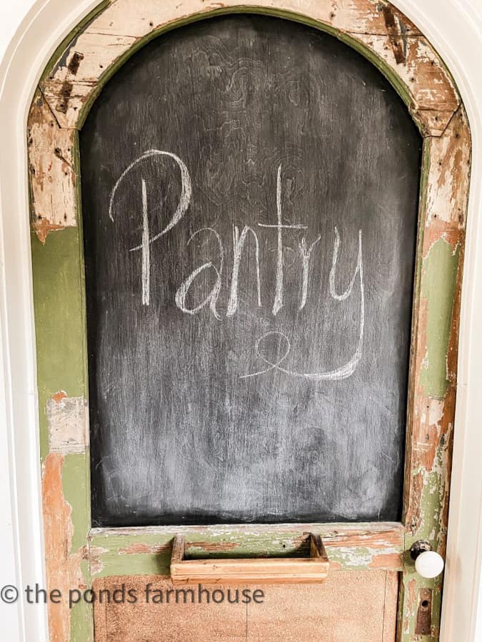 Pantry Door - repurposed old screen door with chalkboard and chippy paint.
