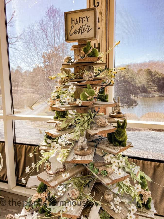 Farmhouse screened porch shiplap Easter Tree. Easter screened porch.