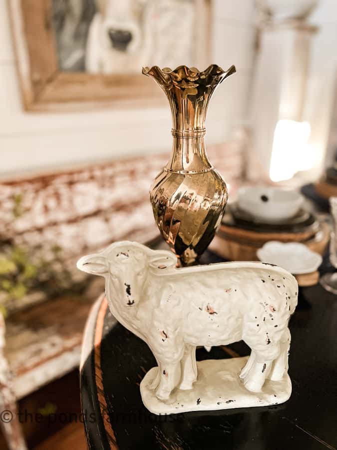 Metal Lamb mold and brass flower vase.