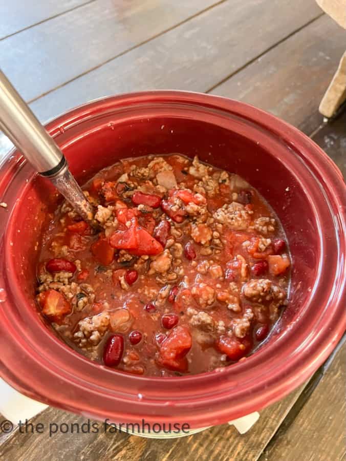 Mix all ingredients into a large crock pot or slow cooker