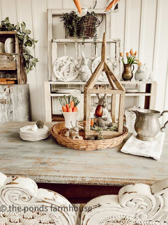 round basket tray with tobacco stick lantern with bunny and carrots.