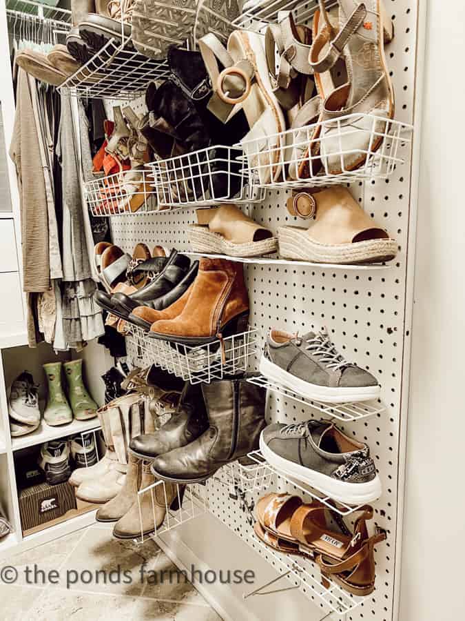 Budget Closet Makeover Ideas for storing shoes on a pegboard wall.  Space saving shoe organization.  