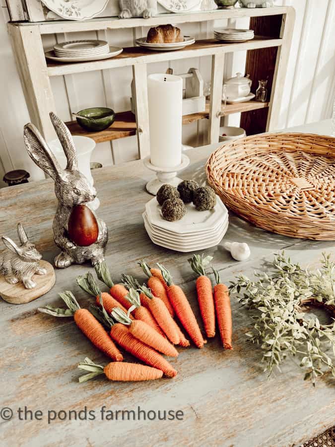 Dollar Tree Supplies used to create a Lantern As Centerpiece idea with Tobacco Stick Lantern and bunnies. Carrots & Bunnies