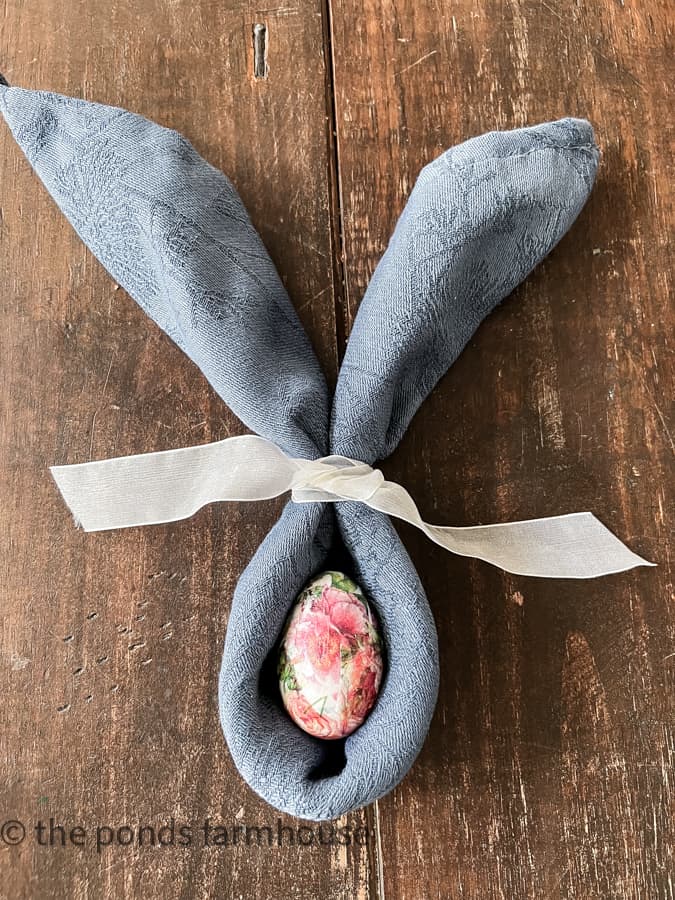 Bunny Ears Folded Napkin Tutorial with Decoupage Easter Egg for Table Settings this Spring.