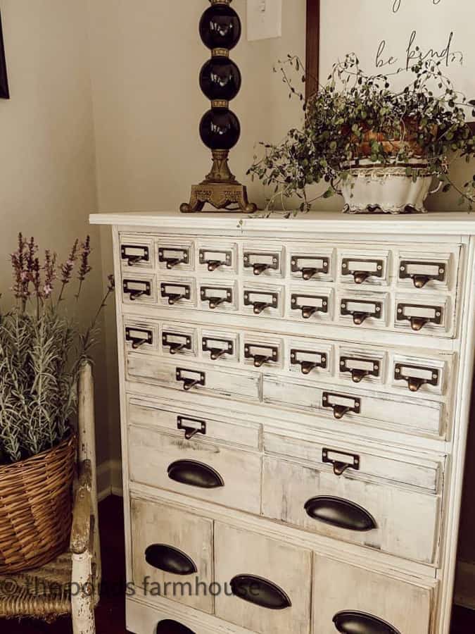 Amazing furniture makeover with new hardware.  Industrial style side table in bedroom.