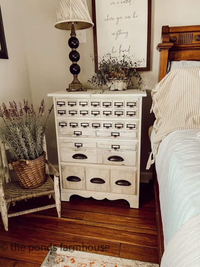 Amazing furniture makeover with new hardware.  Industrial style side table in bedroom.