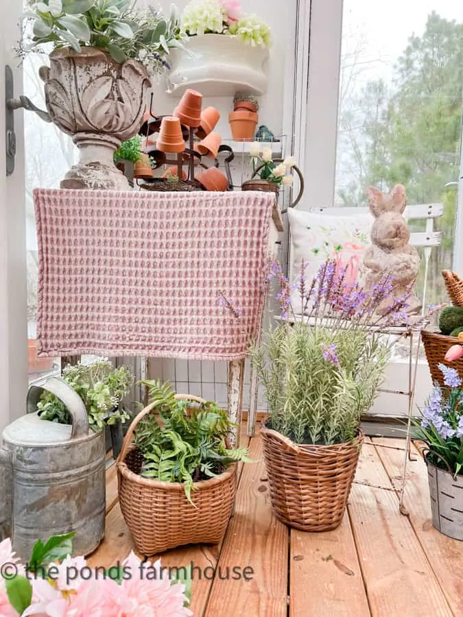 She Shed Interior Ideas for Spring Vignette with baskets of flowers and ferns.  