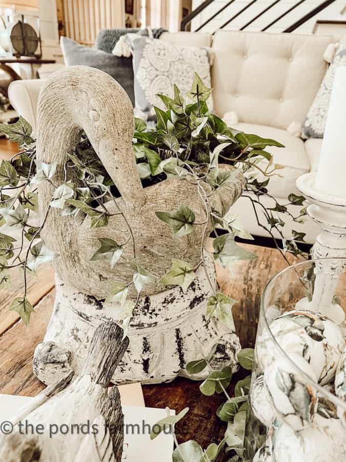 Centerpiece for Coffee Table with concrete swan for 25 Country Chic Decorating Ideas for Spring Home Tour.