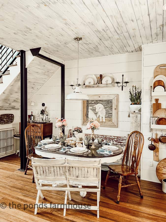 Country Chic Dining Area in Modern Farmhouse with table decorated for Easter with a lamb theme.  