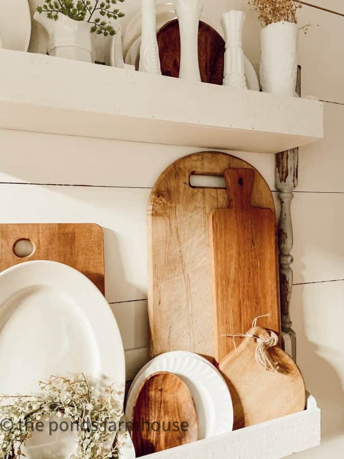 Add vintage breadboards and ironstone to the DIY Plate Rack.  The shelves allow for layering vintage collections.