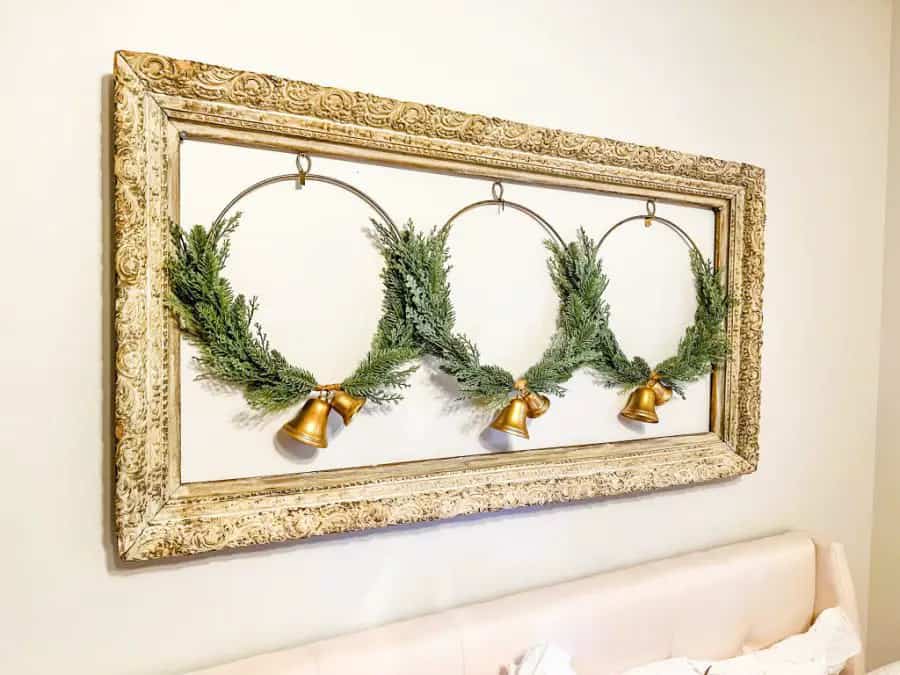 Reuse old picture frames by adding 3 Christmas wreaths for Seasonal Decorating.  
