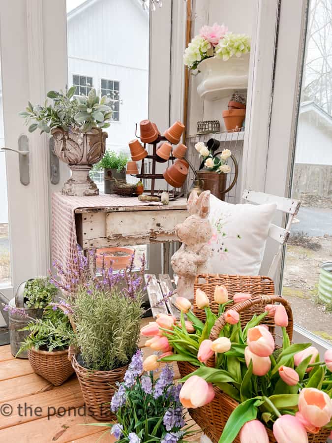 Basket of tulips and chippy desk in She Shed Ideas Inside.  