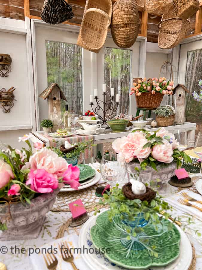 Salad Bar Table Setting with a basket of tulips and DIY birdhouses with peonies and greenery.