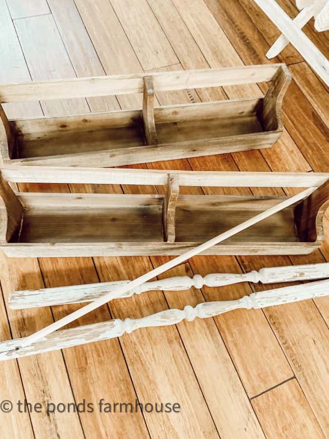 Supplies used to build the DIY Wall Plate Rack.  Two wooden trays and vintage porch spindles.  