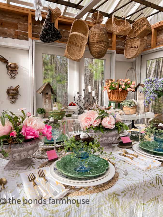 Spring Fling in She she with basket on a DIY ladder over salad bar table and garden themed Supper Club table