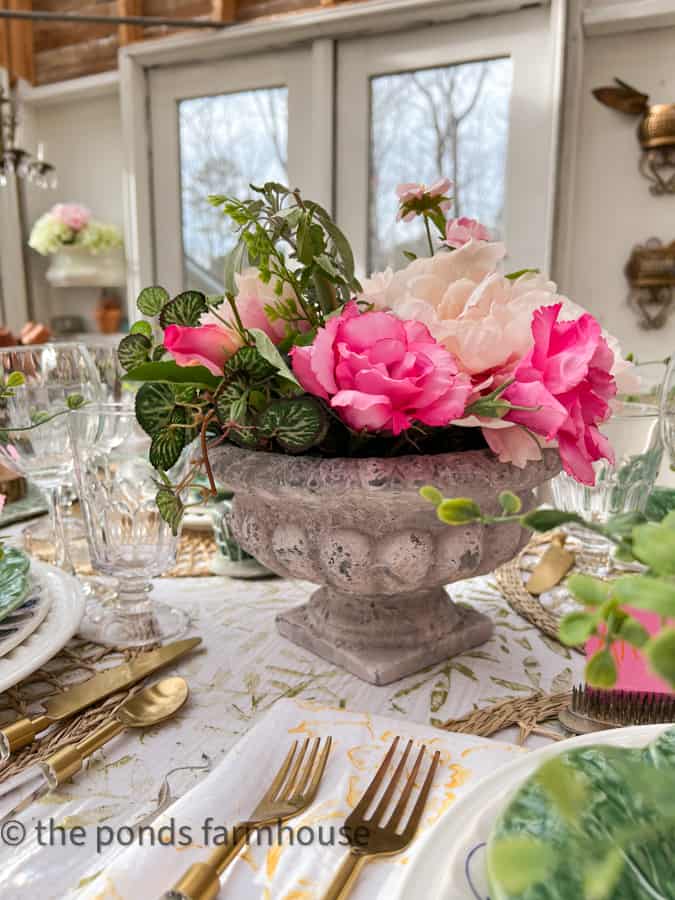 Ideas for Centerpiece with Concrete urn with peonies and gold and acrylic flatware with DIY tablecloth
