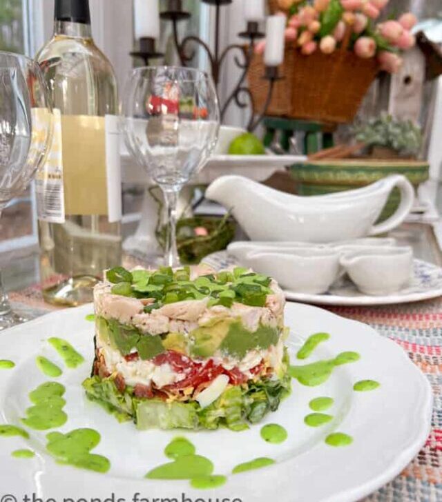 cropped-Cobb-Salad-Stack-with-Chicken-in-green-house-on-salad-bar-table-1.jpg