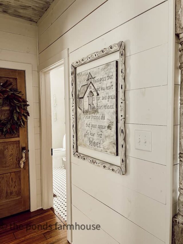 Recycle Vintage picture frame. Vintage picture frame with church painting hanging on shiplap farmhouse wall.