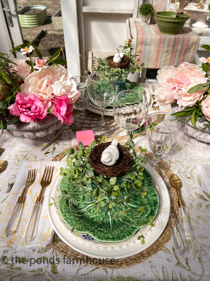 Spring Fling Supper Club Place Setting with Cabbage plates and bird nest on a blue vintage dessert cup.  