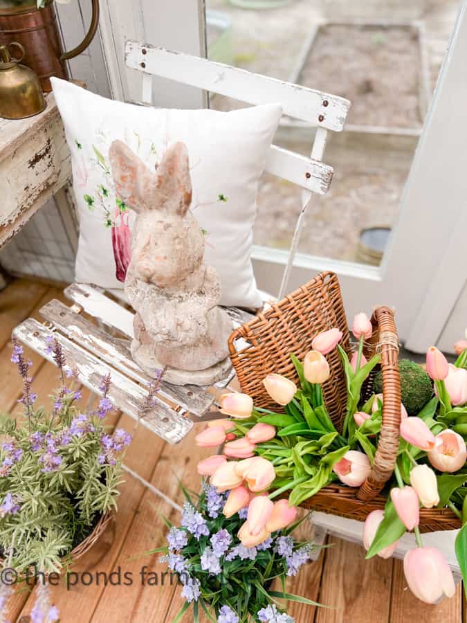 Concrete Bunny and spring pillow with basket of tulips for She She Interior Ideas for Spring Vignette.