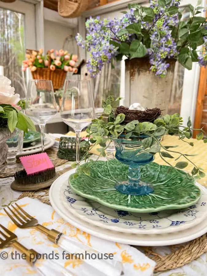 Ideas for Spring Fling Dinner Party with cabbage salad plates and blue dessert dishes with birds nest.  DIY napkins