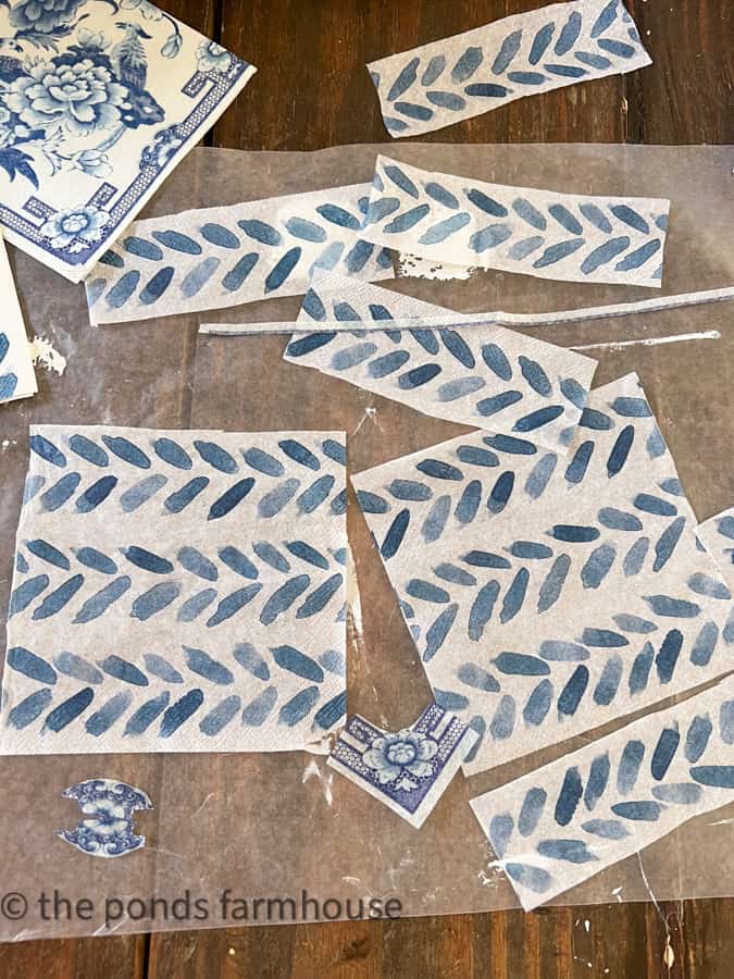 Cut decorative napkins into pieces to add to the box.