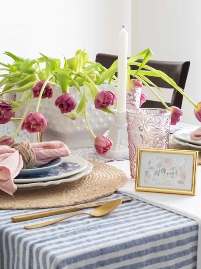 Jennifer's tablescape with tulips and pink colors.for supper club table setting