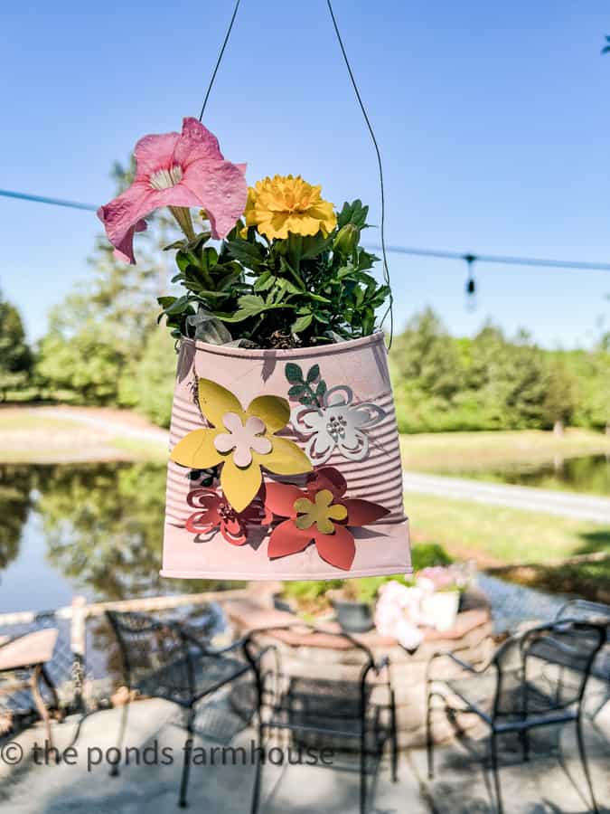 Hanging flower pocket made with recycled tin can and aluminum flowers.  DIY Valentine's Gift Ideas.