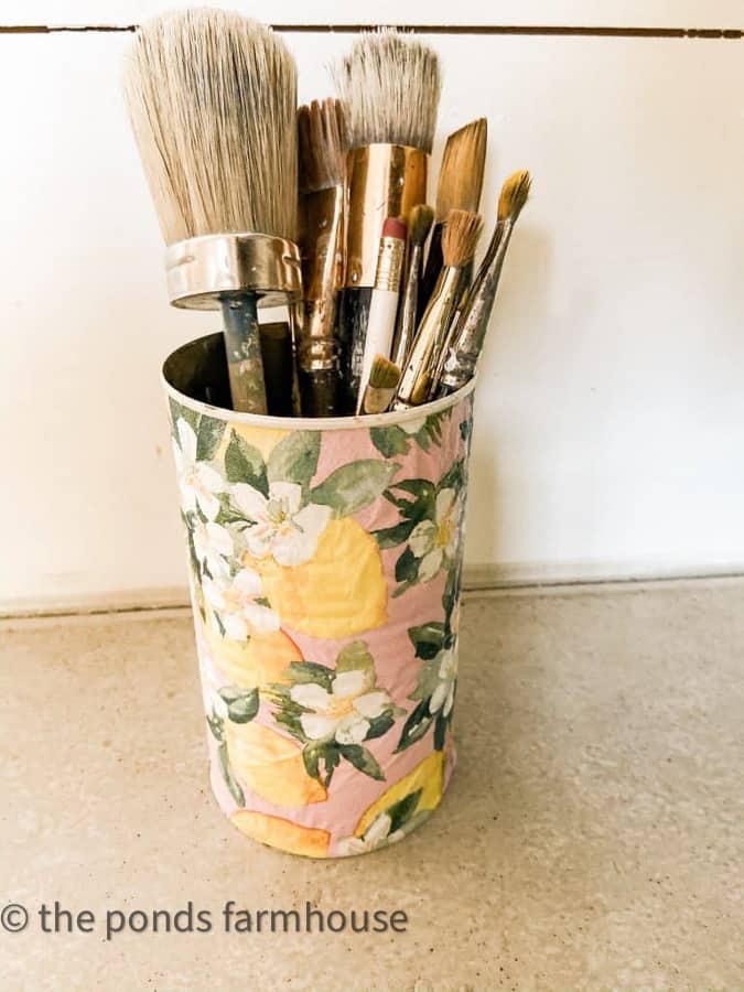 Paint brush holder from old tin can.