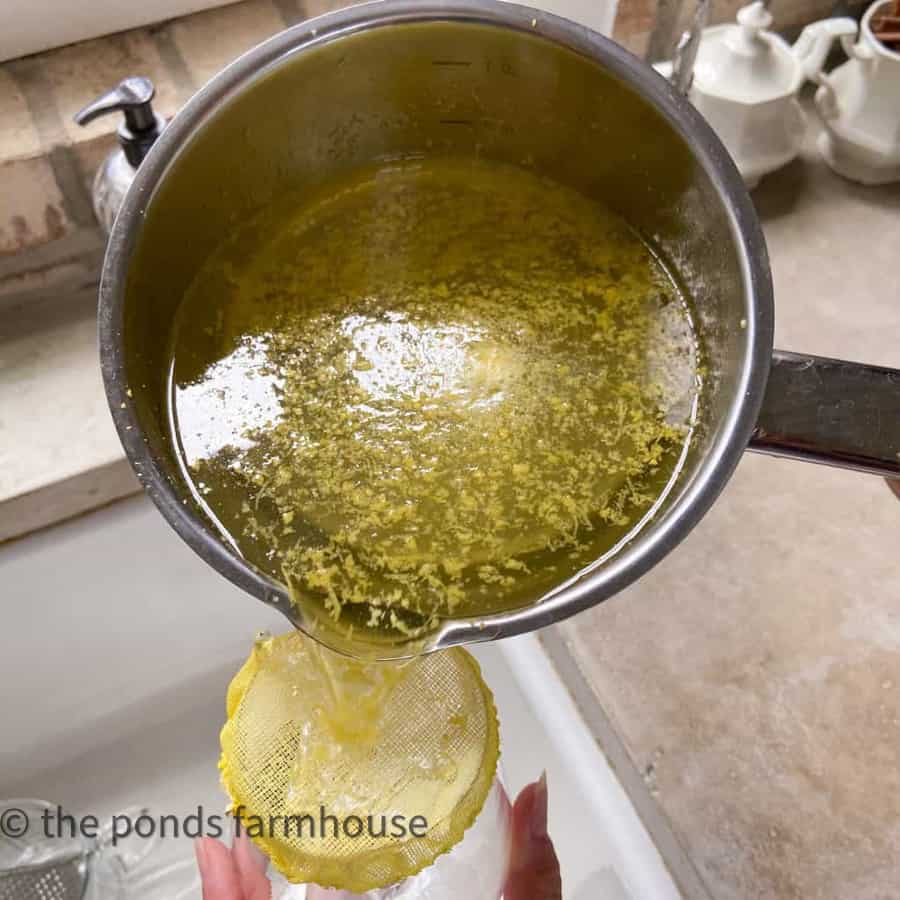 the secret to make fresh squeezed perfect lemonade, strain the lemon zest.