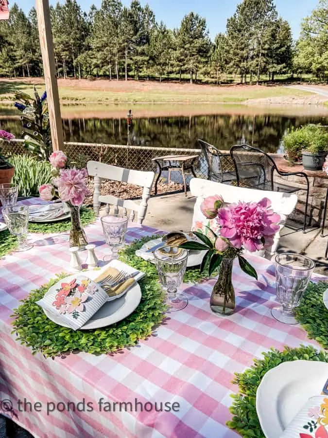 Mother's Day Alfresco Luncheon table at outdoor kitchen with DIY cutlery holders.