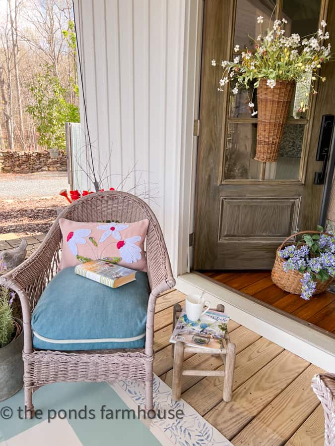 DIY Scrap Fabric Pillows and vintage wicker seating for farmhouse style porch sitting ideas.