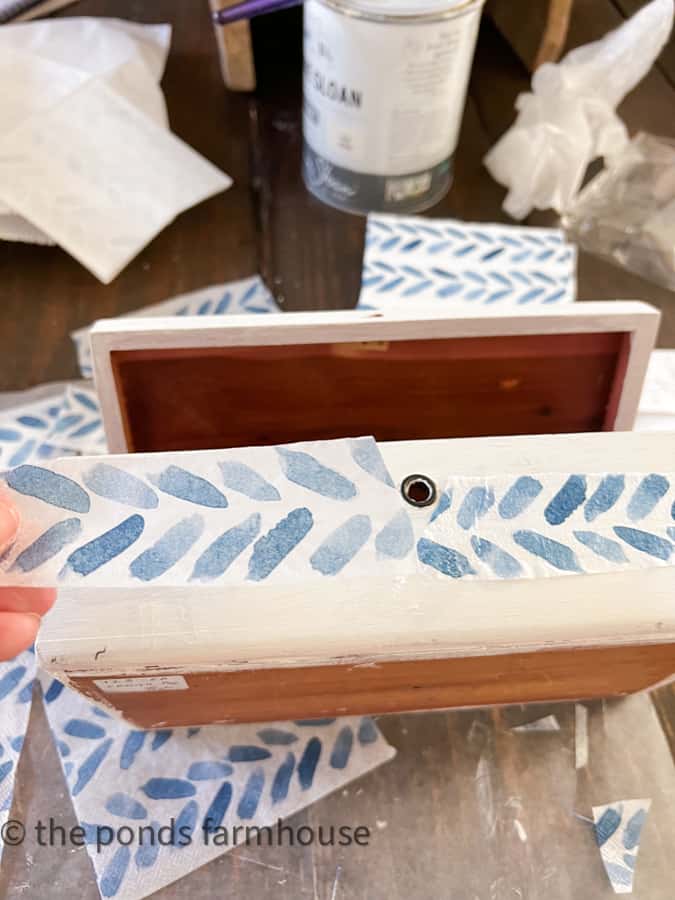 Test the napkin pieces to begin decorating a wooden box