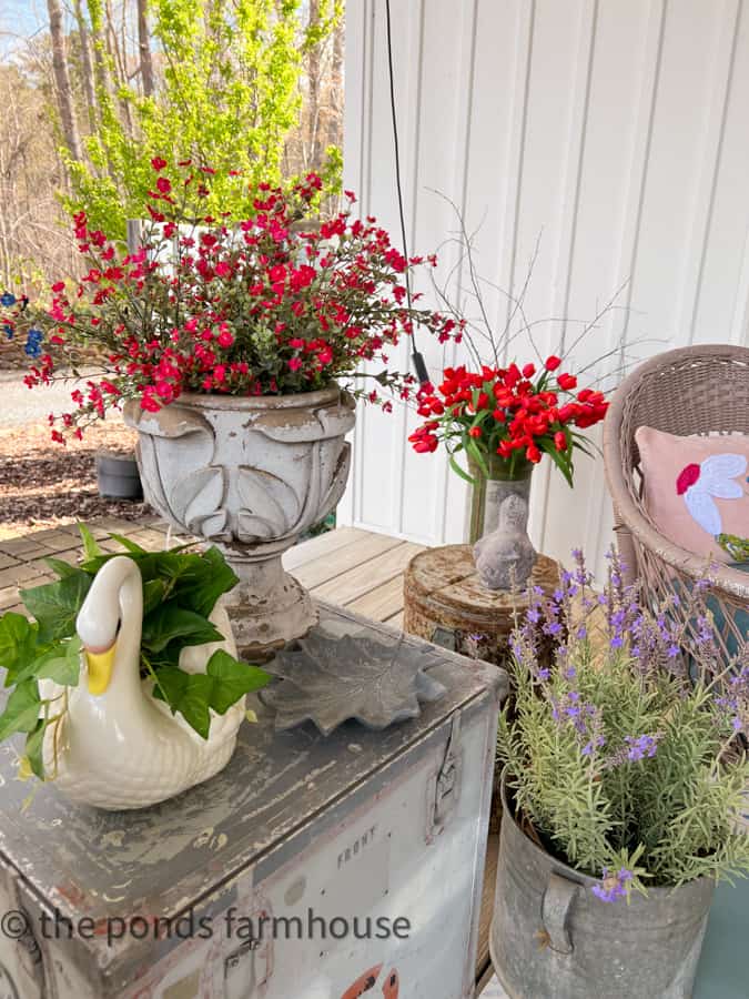 Mix of faux and real flowers for outdoor living.