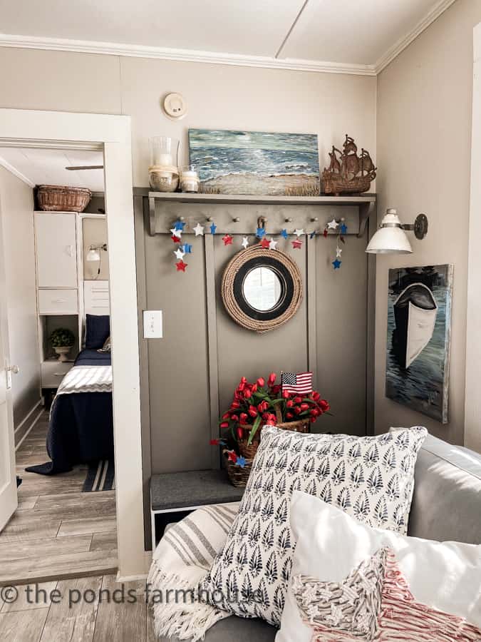 Accent Wall filled with nautical and coastal cottage decor for the 4th of July celebration.