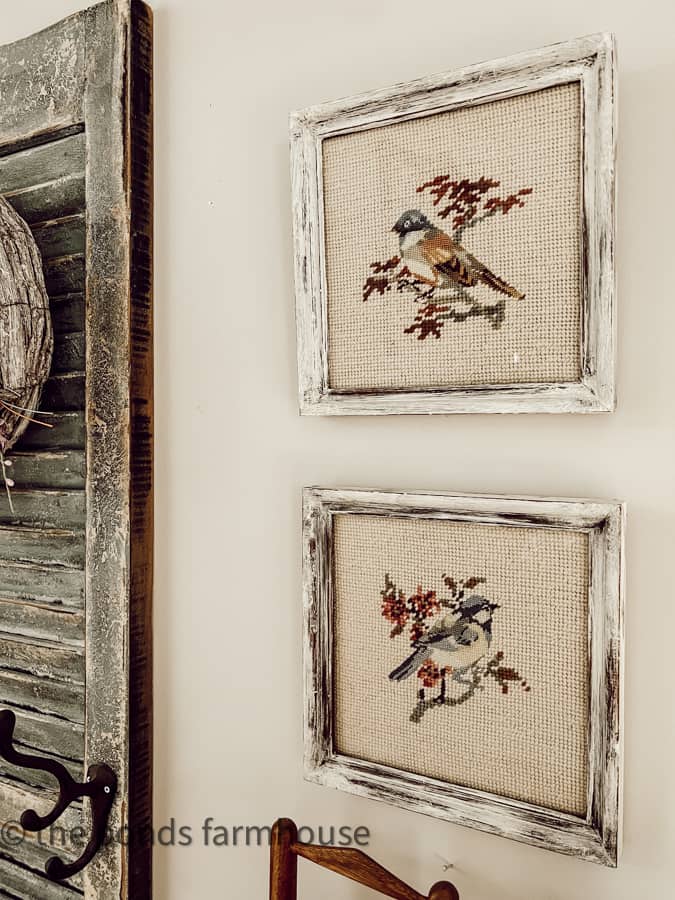 thrift store needlepoint prints with DIY painted frames for easy thrifted update.  