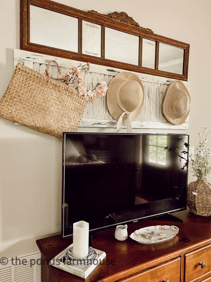 Old Shutter with hats over TV. 