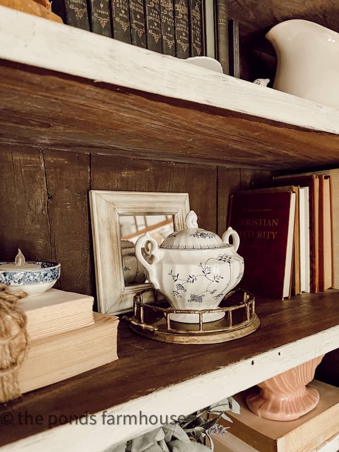 Add mirror behind vintage sugar bowl to reflect light for bedroom decor ideas.  