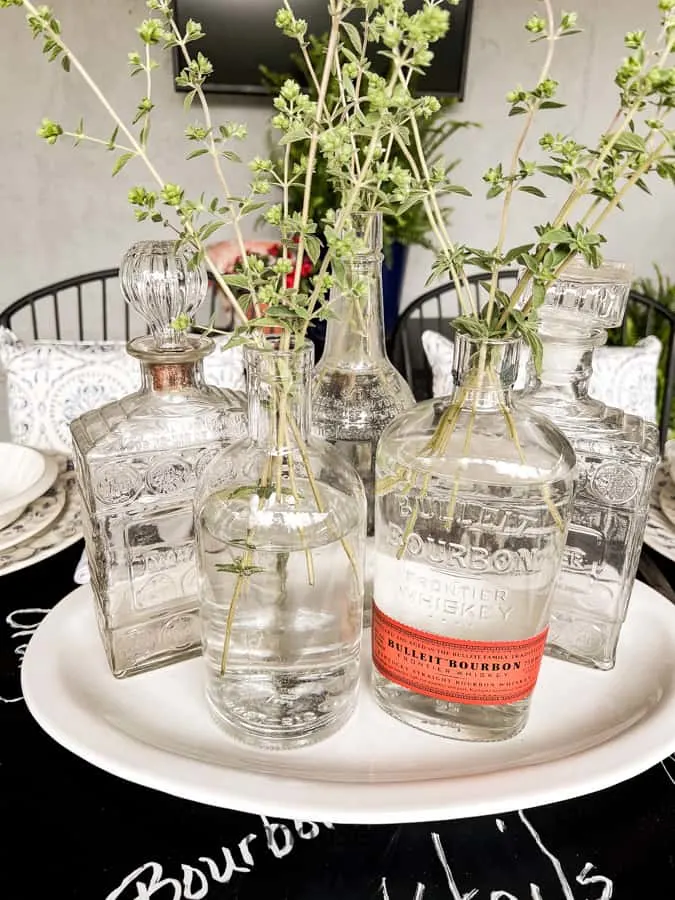 Father's Day Dinner Ideas with Old Fashioned Bourbon Bottles for the centerpiece.