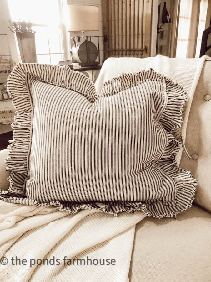 DIY ticking fabric pillow with ruffles.  Great Farmhouse Home Decor.  