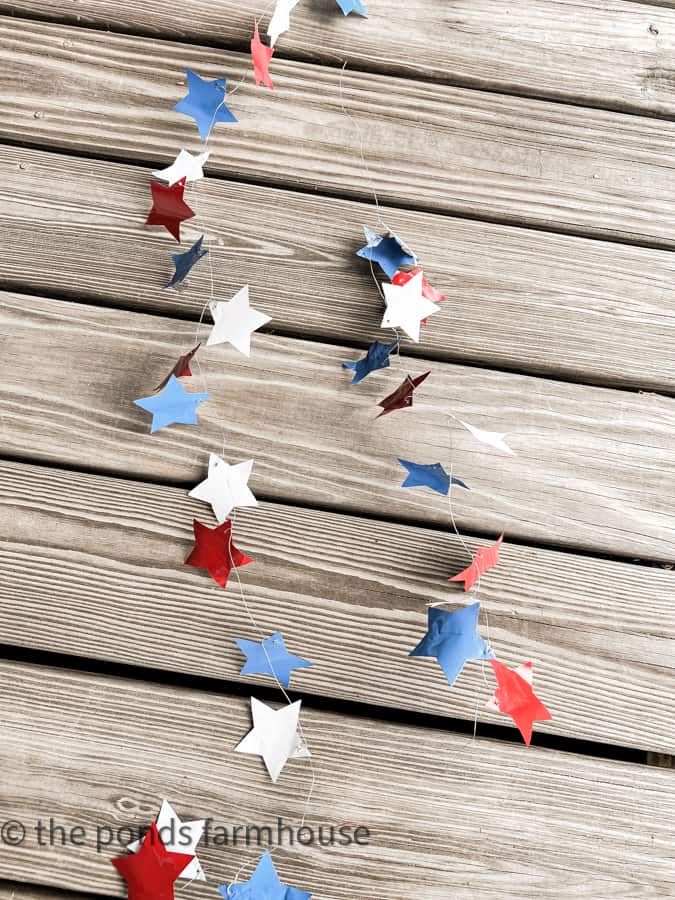 DIY Aluminum Can Star Garland For A Patriotic and Eco-friendly Decor Project.  Red White & Blue Star Garland